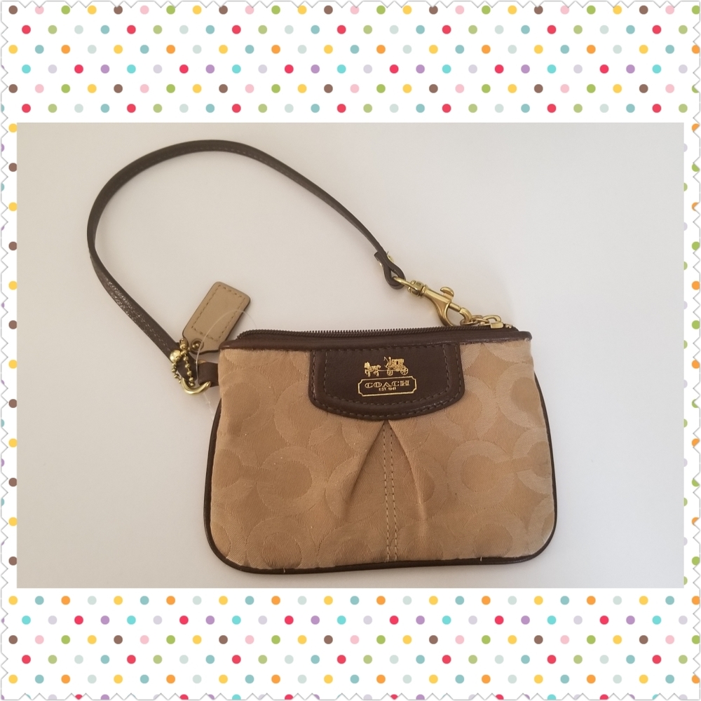 Coach small light brown/tan wrislet
